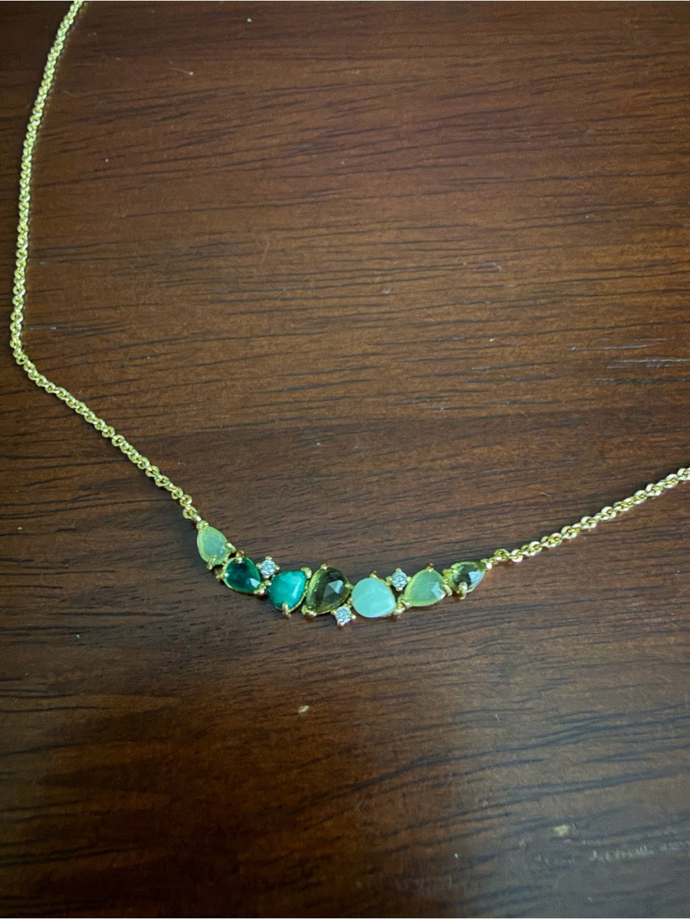 NEW ANTHROPOLOGIE Gold necklace with green and clear stones
